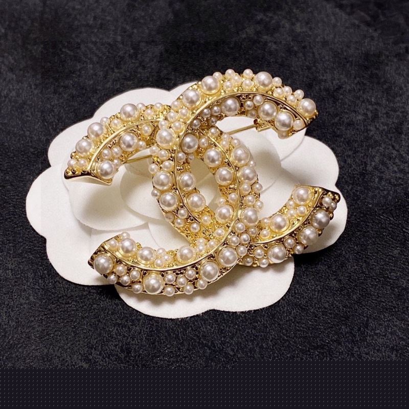 Ch*el brooches